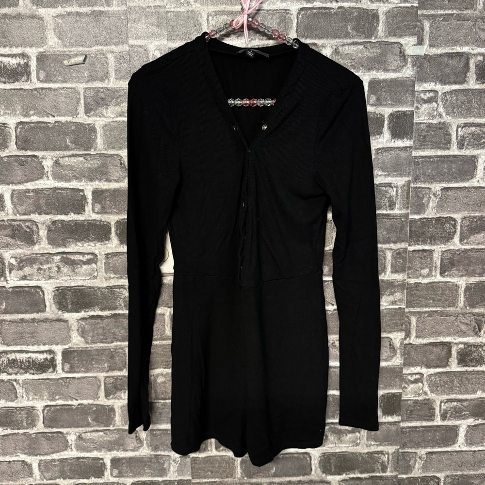 Lulus romper black ribbed snap chest buttons